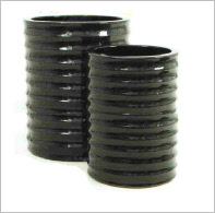 Tall round ribbed plant containers