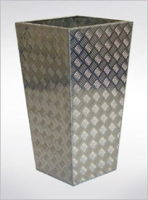 Tall tapered planter in '5 bar' finish steel