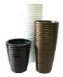 Tall tapered round ribbed plant container